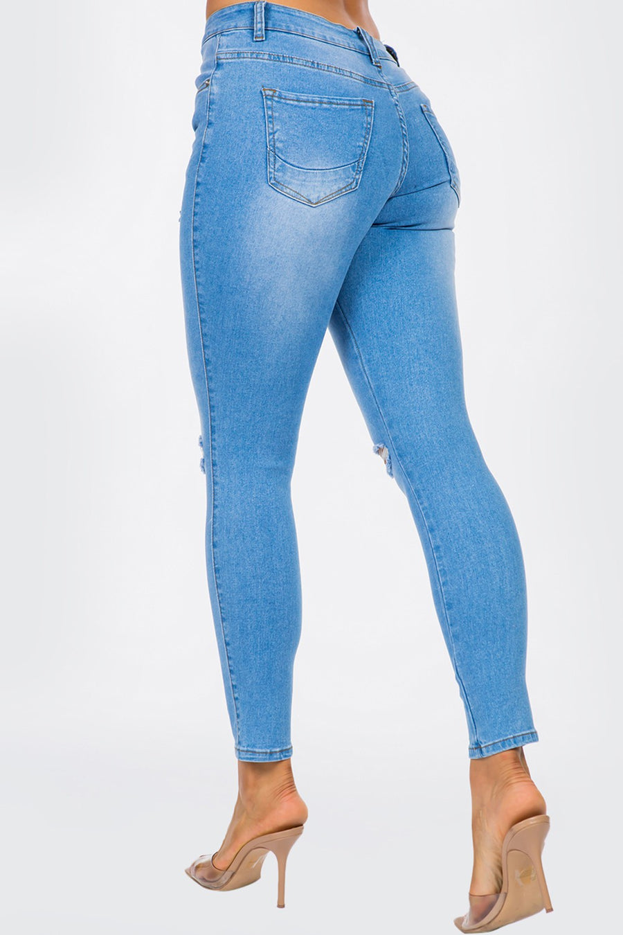 Distressed Mid Rise Skinny Jeans