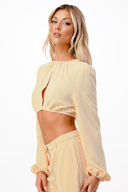 BUTTER FRONT SLIT LONG SLEEVE TIE BACK CROP TOP