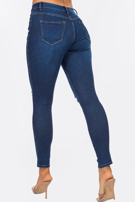Distressed Mid Rise Skinny Jeans