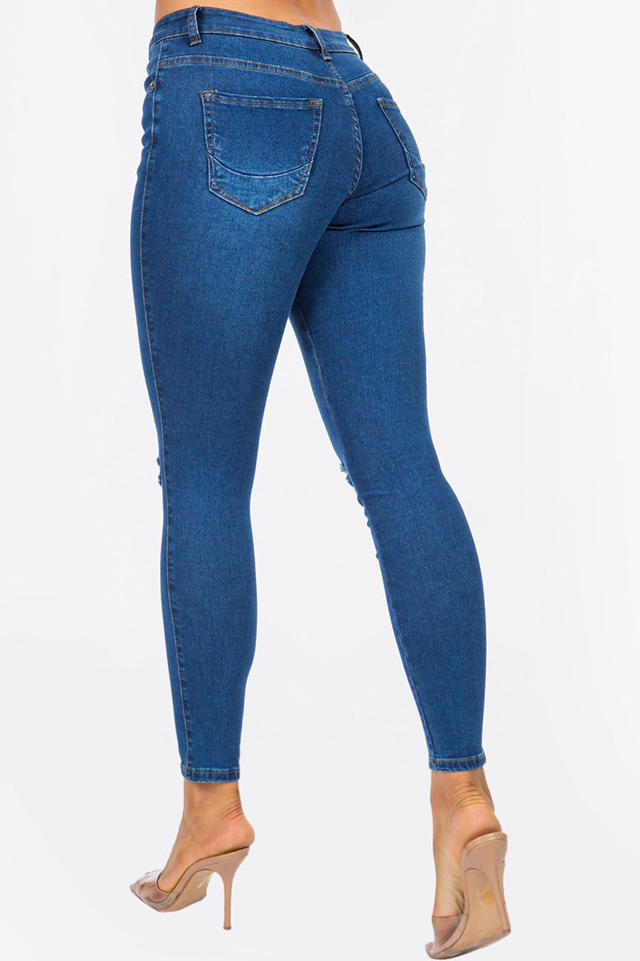 Distressed Mid Rise Skinny Jeans