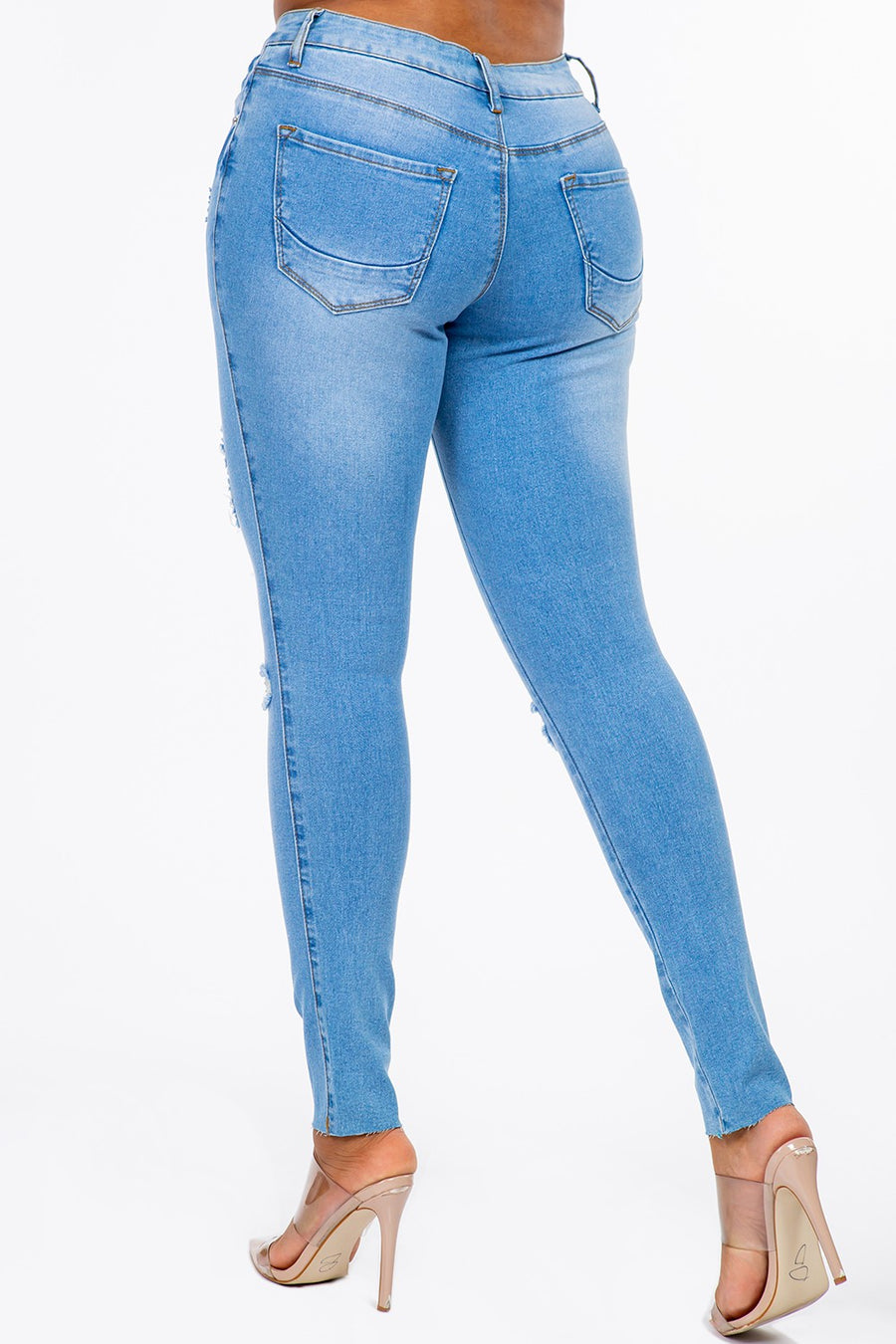 Distressed Mid Rise Skinny Jeans