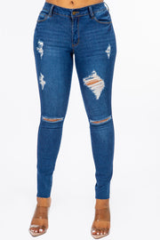 Distressed Mid Rise Skinny Jeans