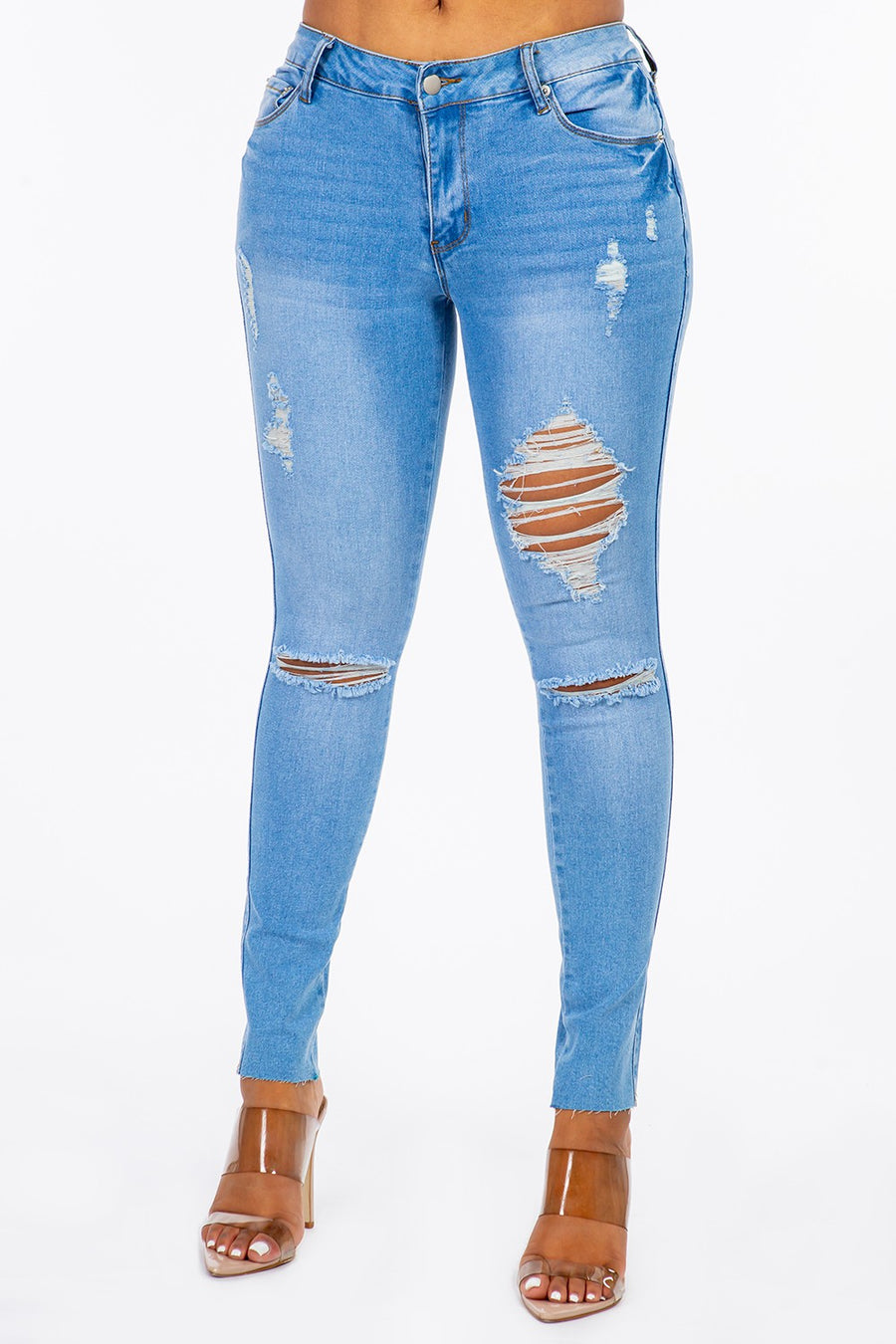 Distressed Mid Rise Skinny Jeans